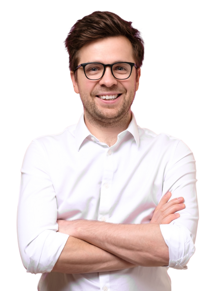 A smiling man with his arms crossed, indicating confidence and reliability in Cincinnati digital marketing.